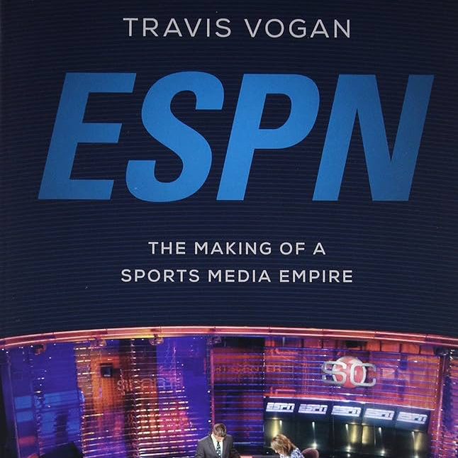 The SportsCenter news desk with two anchors figures at the bottom of a book about ESPN by Travis Vogan